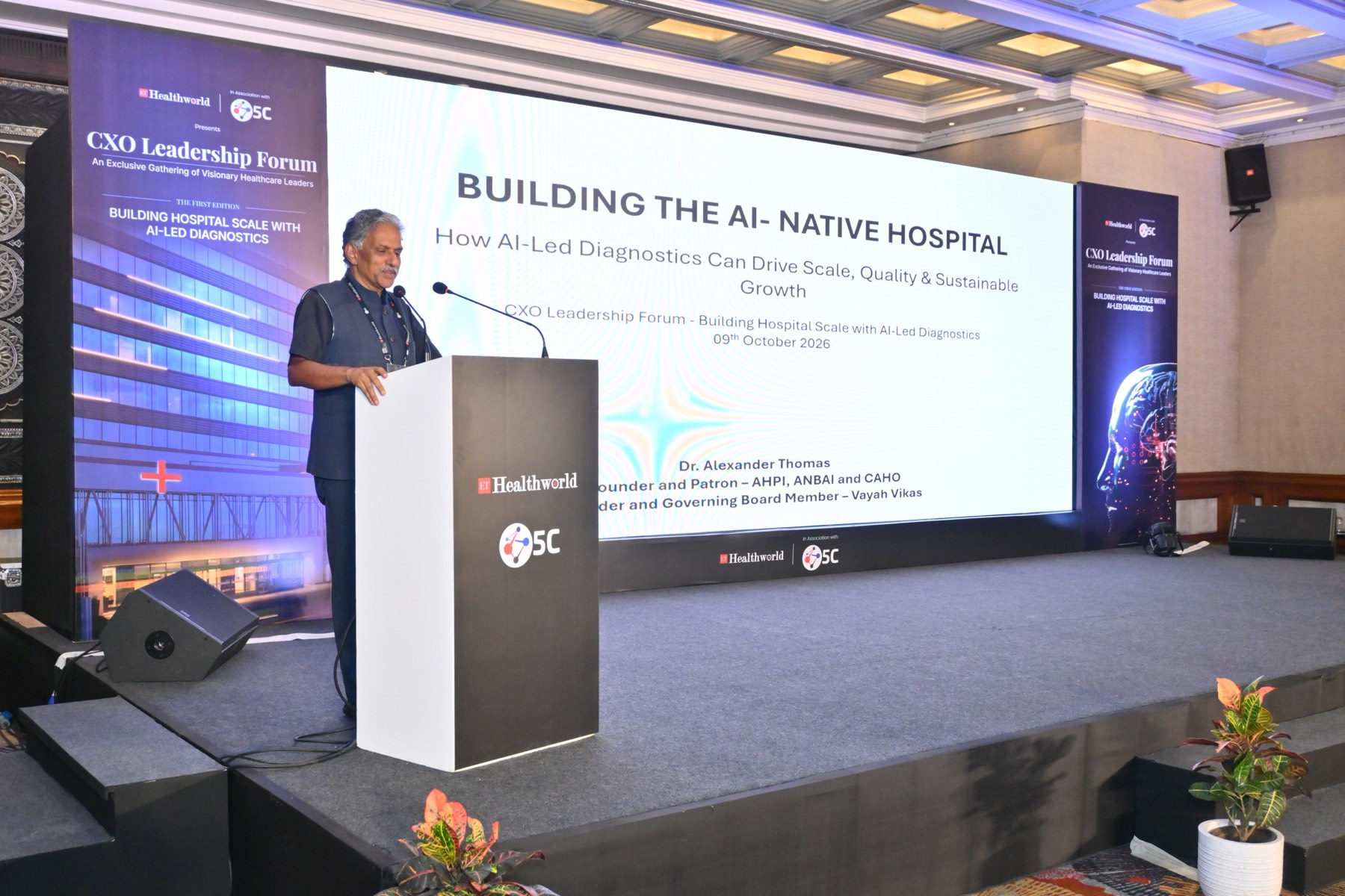Dr. Alexander Thomas delivering the keynote, Building the AI-Native Hospital.