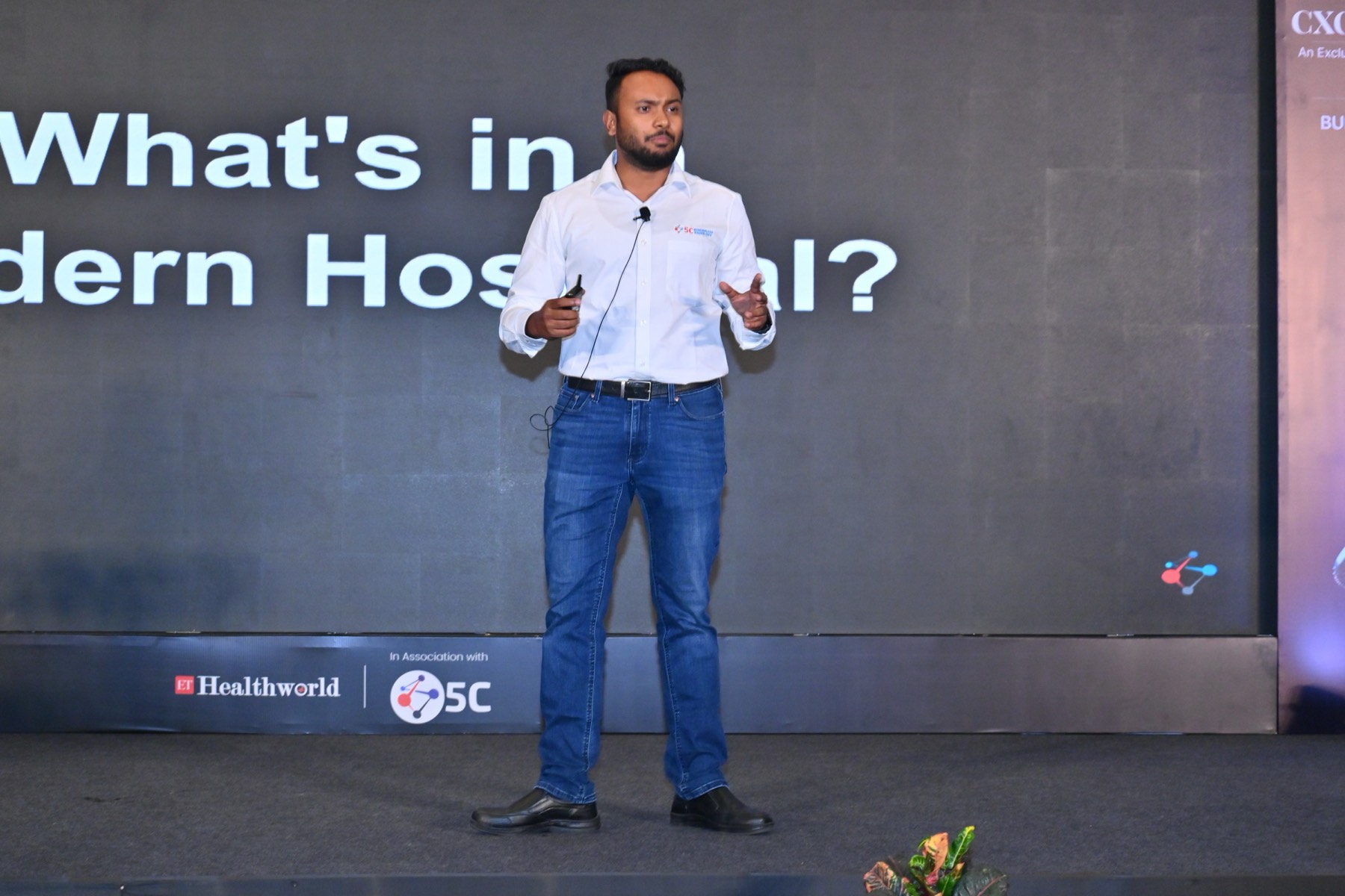 Kalyan Sivasailam on stage beneath the question, What’s in a modern hospital?